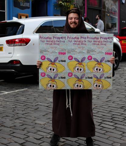 Josh with sign Victoria Street