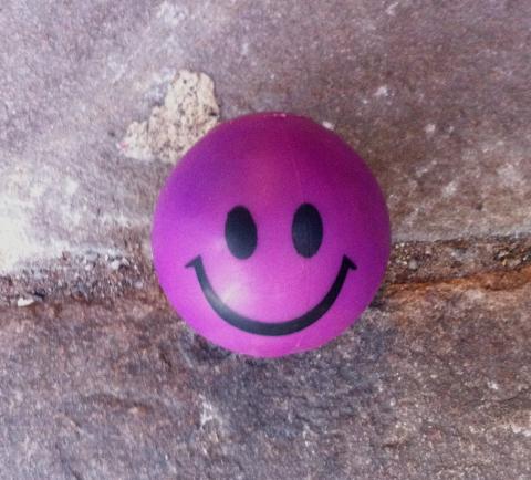 Purple ball smiley face